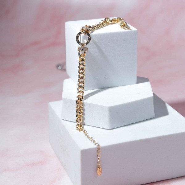 Yellow Gold Bracelet with Circle Shape in the Middle  Adorned with Stones Like Diamonds
